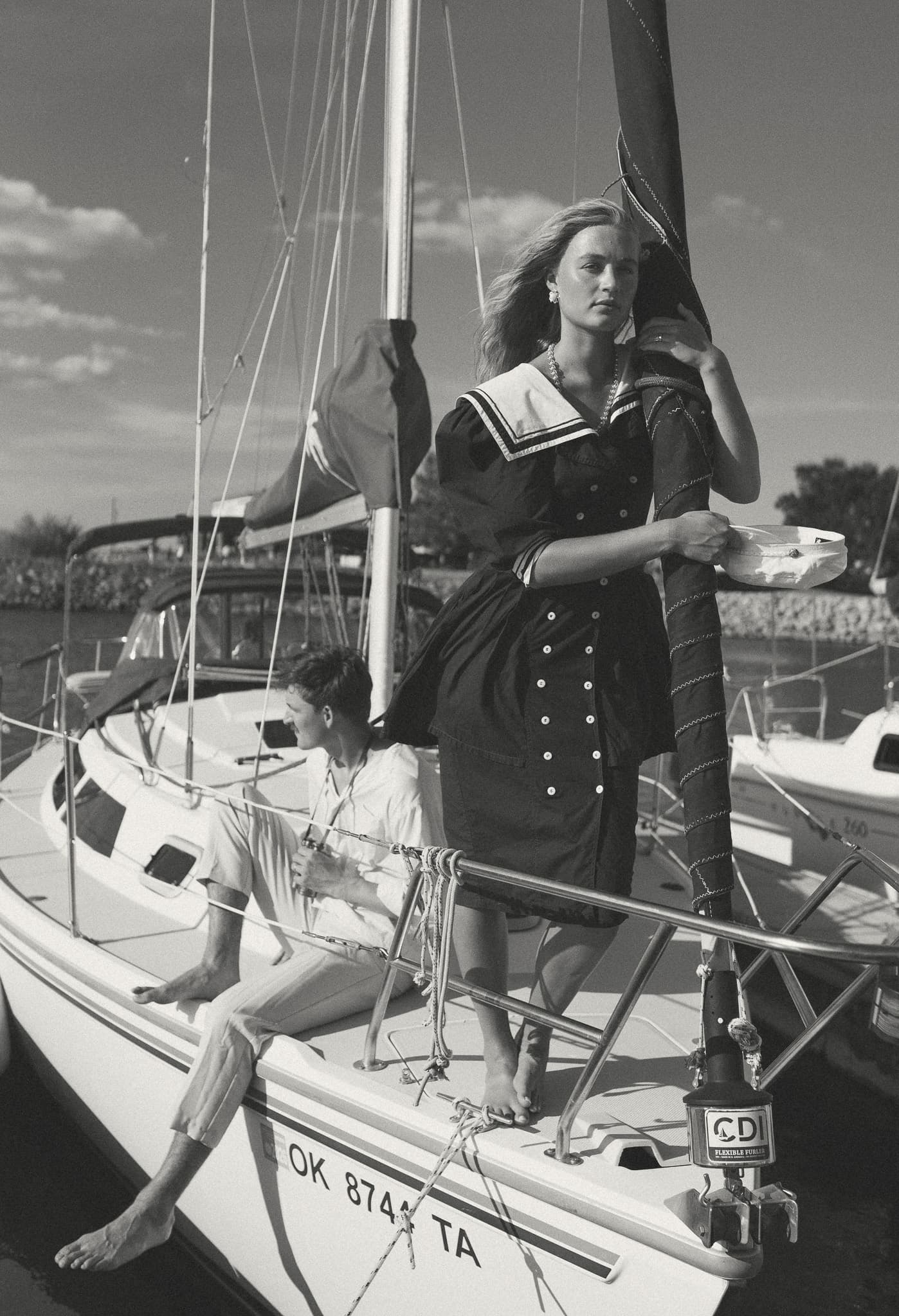 Black-and-white portrait on a sailboat